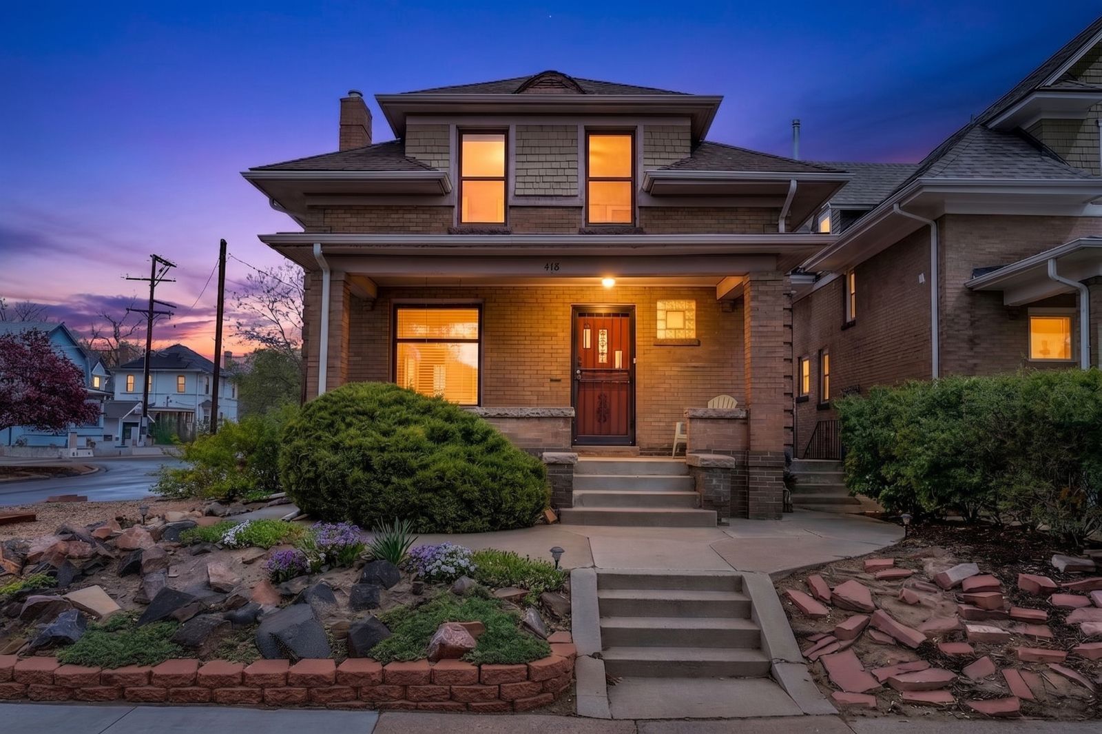 Front elevation of 478 N Logan Street at twilight